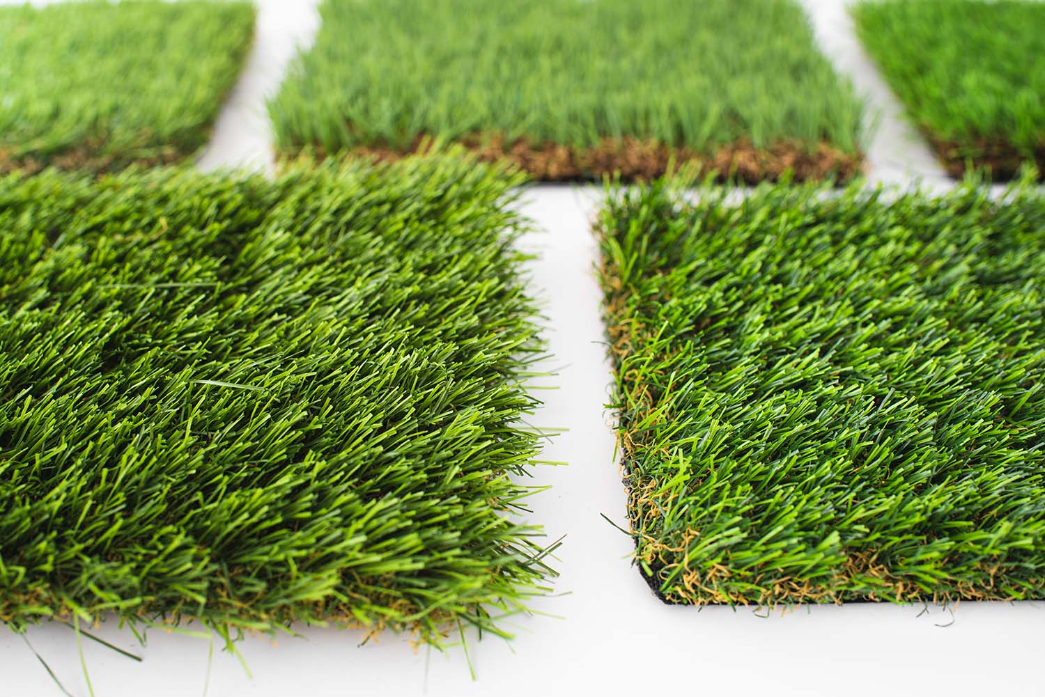 Comparing Artificial Turf to Natural Grass: Why Red Deer Homeowners Are Making the Switch